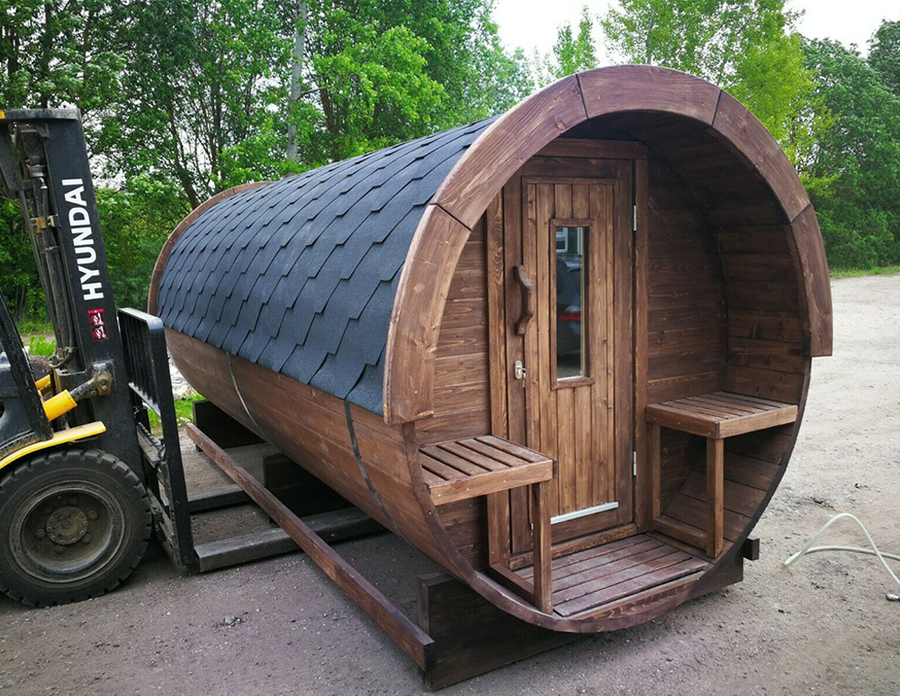 Contemporary log cabin installation in Spalding and Boston